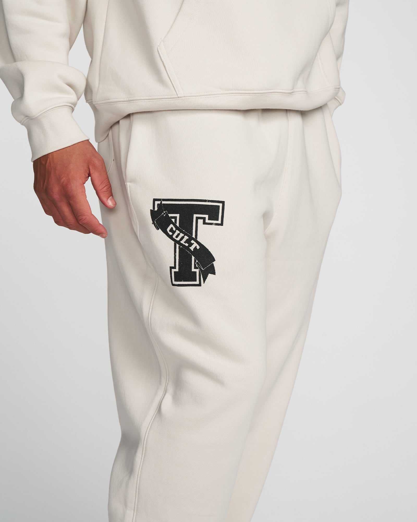 COLLEGIATE CUFFLESS RELAXED TRACKPANTS