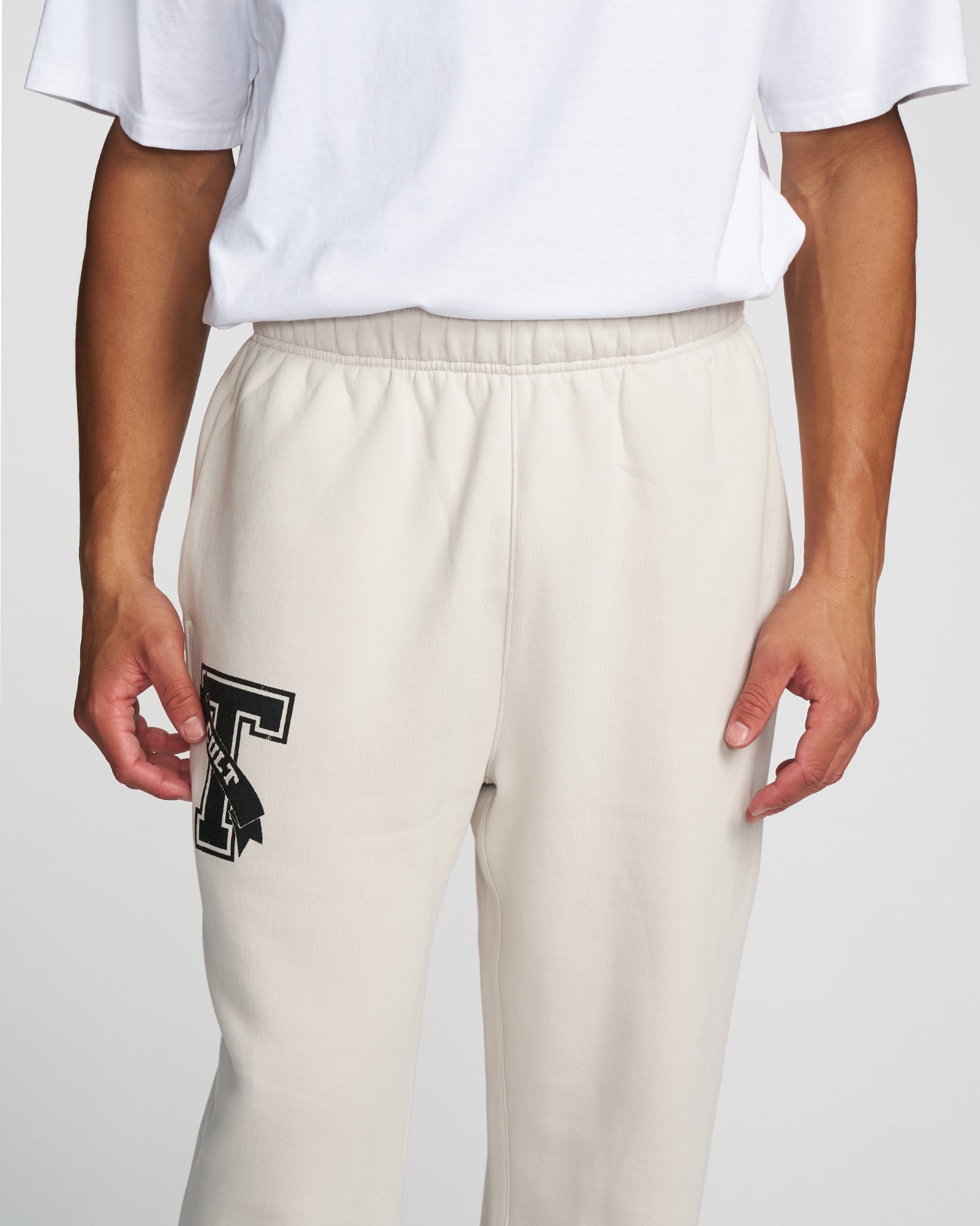 COLLEGIATE CUFFLESS RELAXED TRACKPANTS